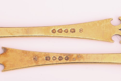 Lot 108 - A cased set of silver gilt spoons and sugar...