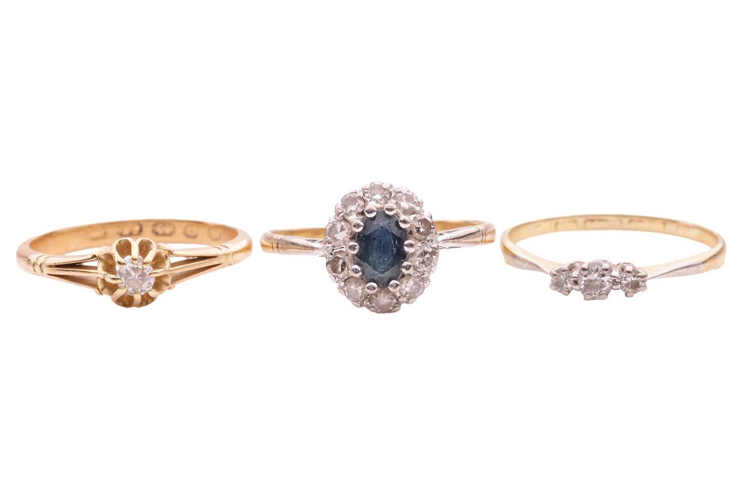 Lot 38 - Three gem-set rings; comprising a sapphire and...