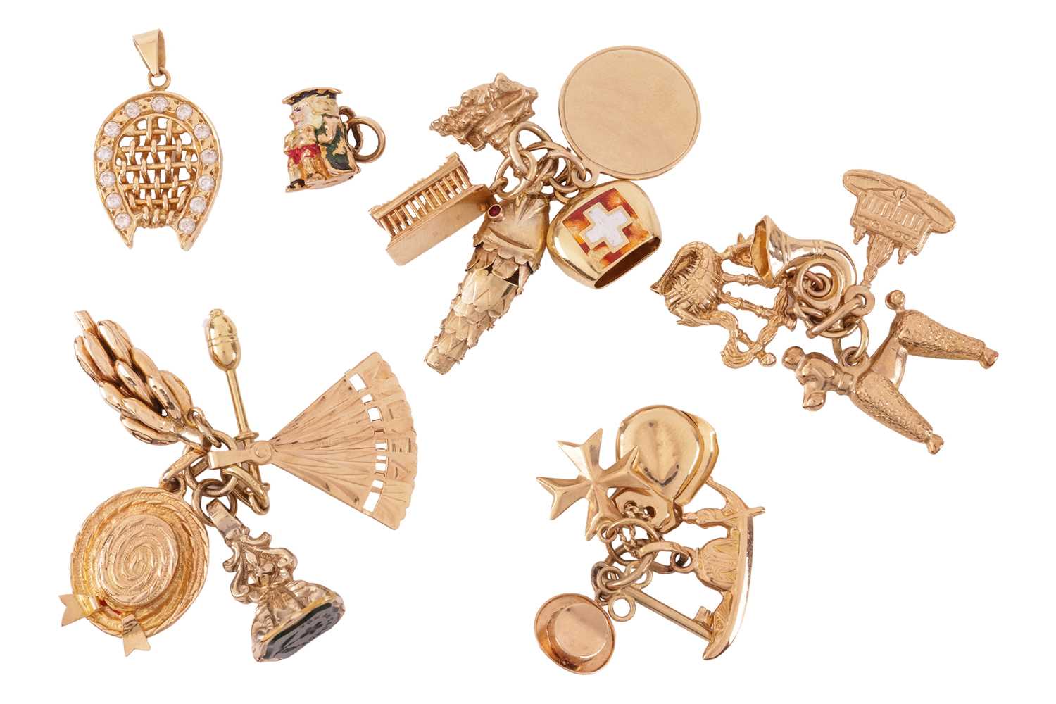 Lot 15 - A collection of charms and pendants, including...