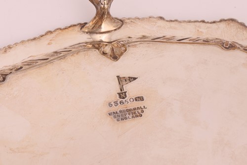 Lot 88 - A George III four-bottle cruet stand and...