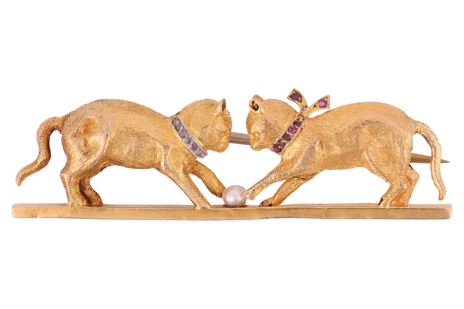 Lot 1 - A gem-set cat brooch, in the form of two cats...