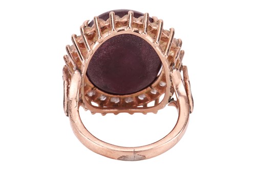 Lot 34 - A star sapphire and diamond dress ring,...