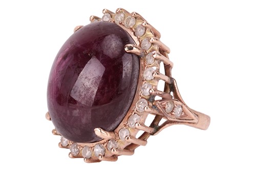 Lot 34 - A star sapphire and diamond dress ring,...
