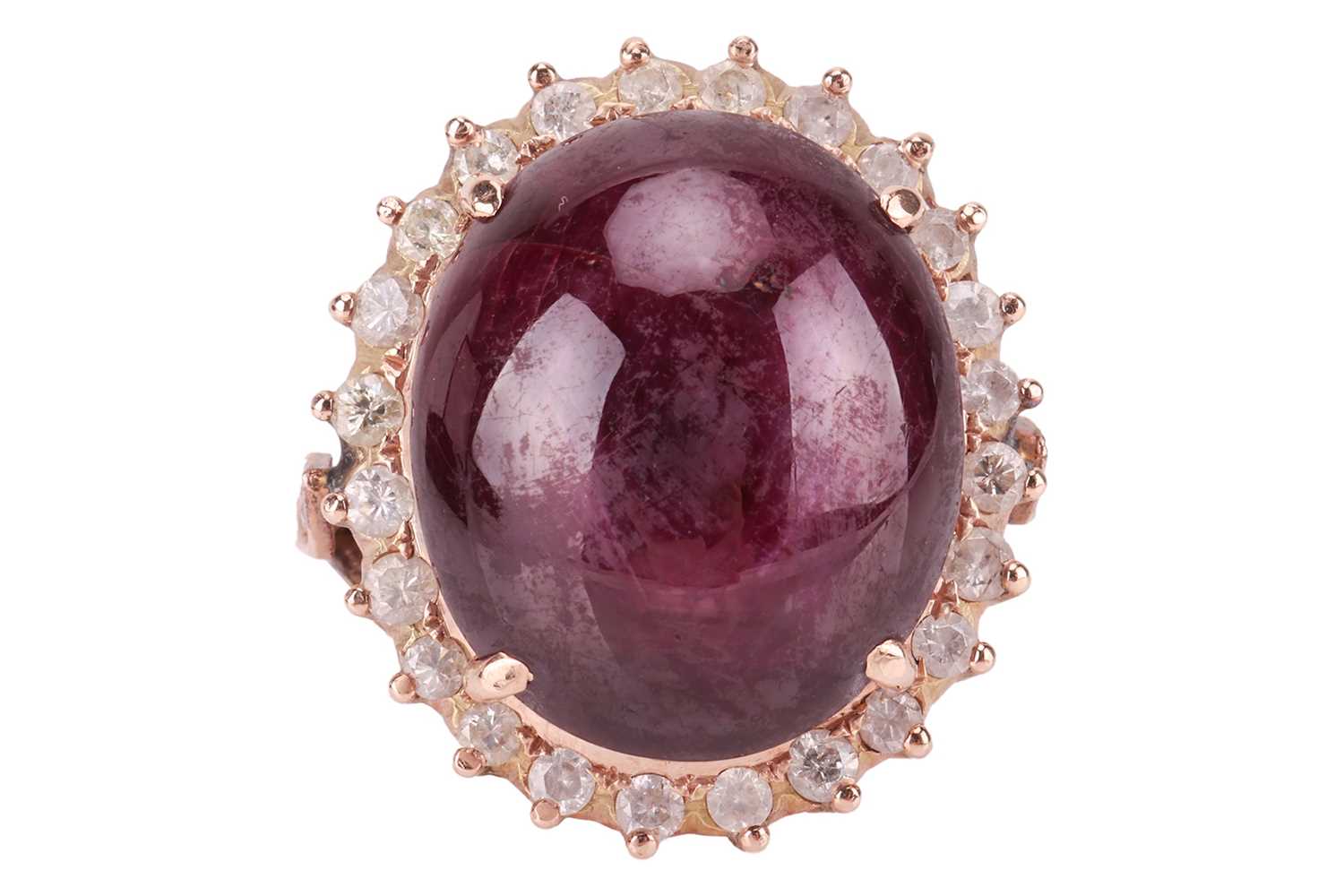 Lot 34 - A star sapphire and diamond dress ring,...