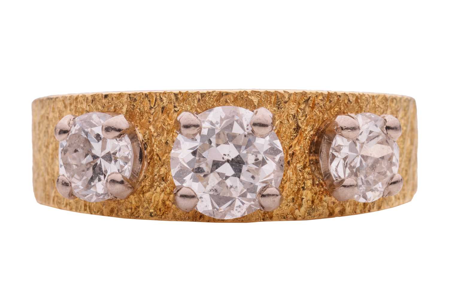 Lot 28 - A diamond three stone ring in 18ct, comprised...