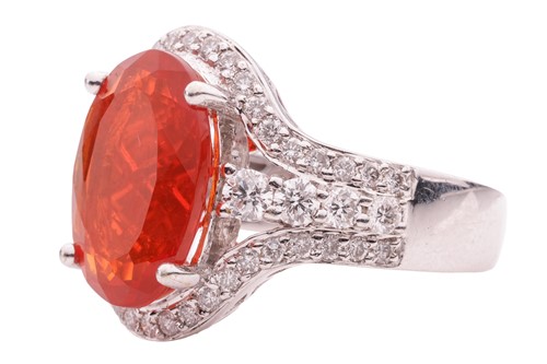 Lot 36 - A fire opal and diamond-set cluster ring, the...