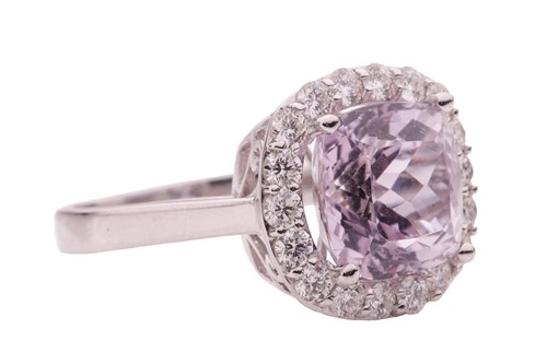 Lot 50 - A kunzite and diamond halo ring in 18ct white...