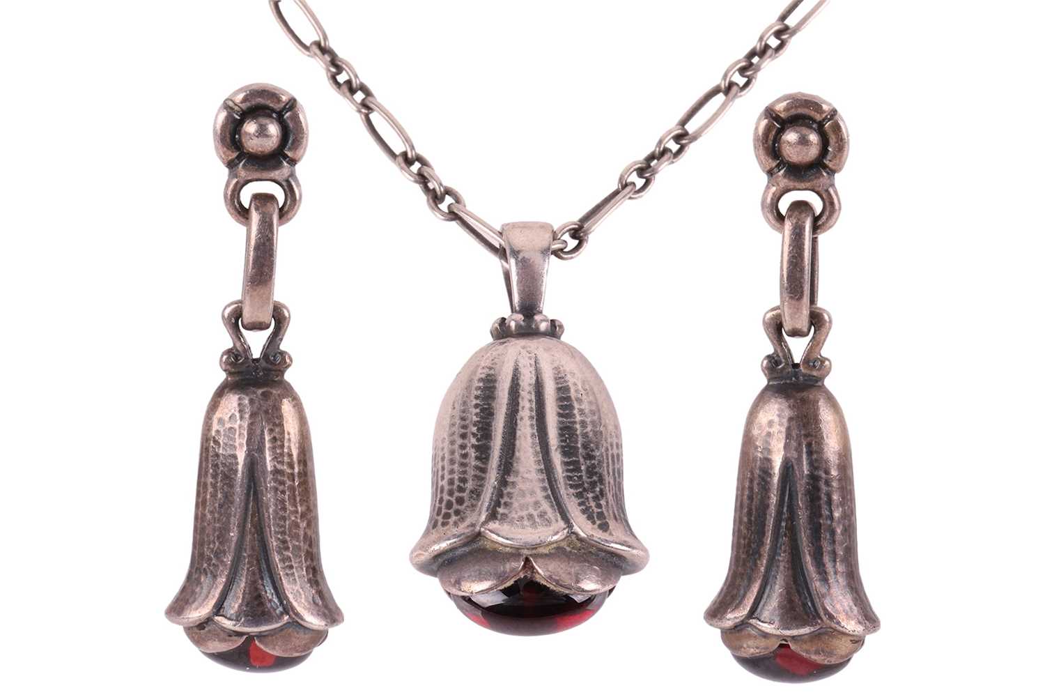 Lot 222 - Georg Jensen - Garnet floral pendant and...