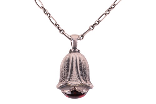 Lot 222 - Georg Jensen - Garnet floral pendant and...
