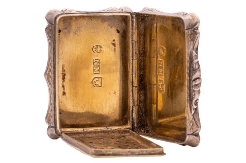 Lot 311 - A Victorian cartouche-shaped vinaigrette,...