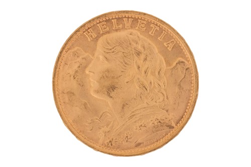 Lot 22 - A Switzerland 1935 gold 20 Francs coin with...