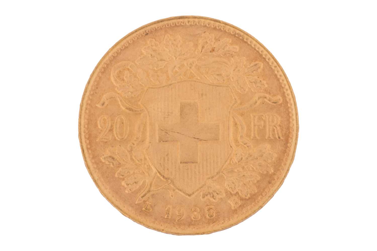 Lot 22 - A Switzerland 1935 gold 20 Francs coin with...