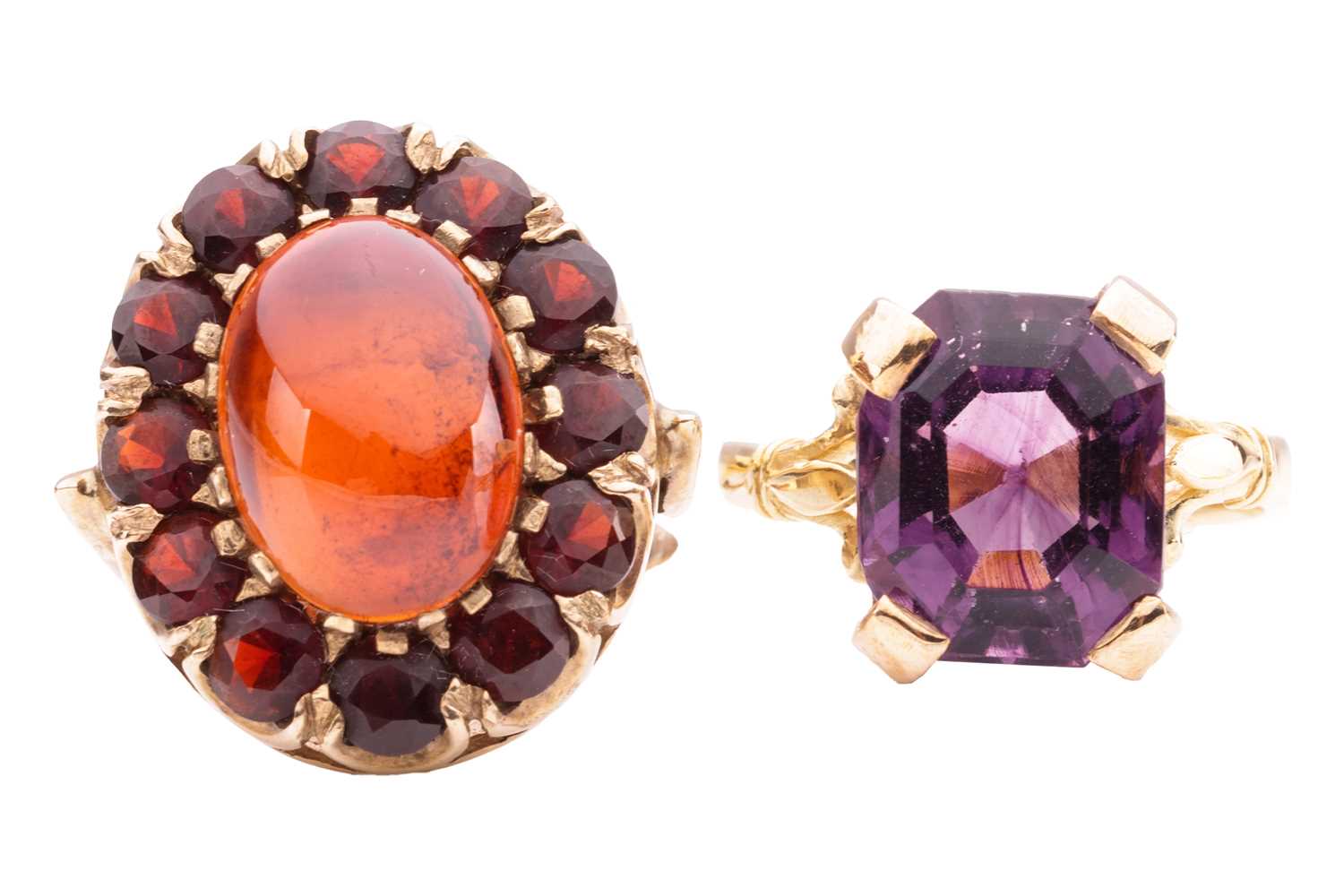 Lot 42 - Two paste dress rings; to include a red paste...