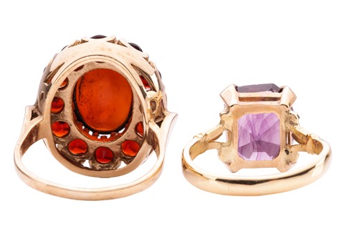Lot 42 - Two paste dress rings; to include a red paste...
