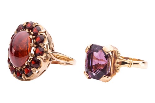Lot 42 - Two paste dress rings; to include a red paste...