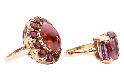 Lot 42 - Two paste dress rings; to include a red paste...