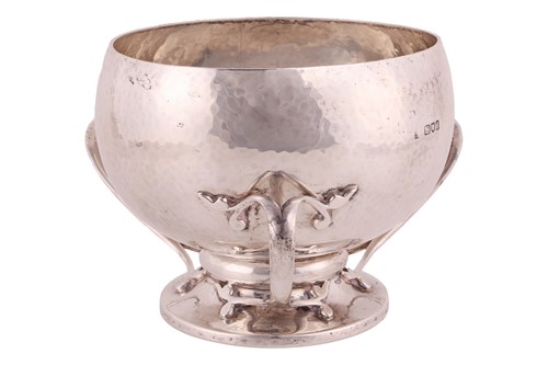 Lot 358 - An Arts and Crafts silver bowl by Wakely &...