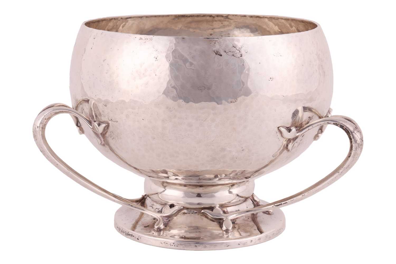 Lot 358 - An Arts and Crafts silver bowl by Wakely &...