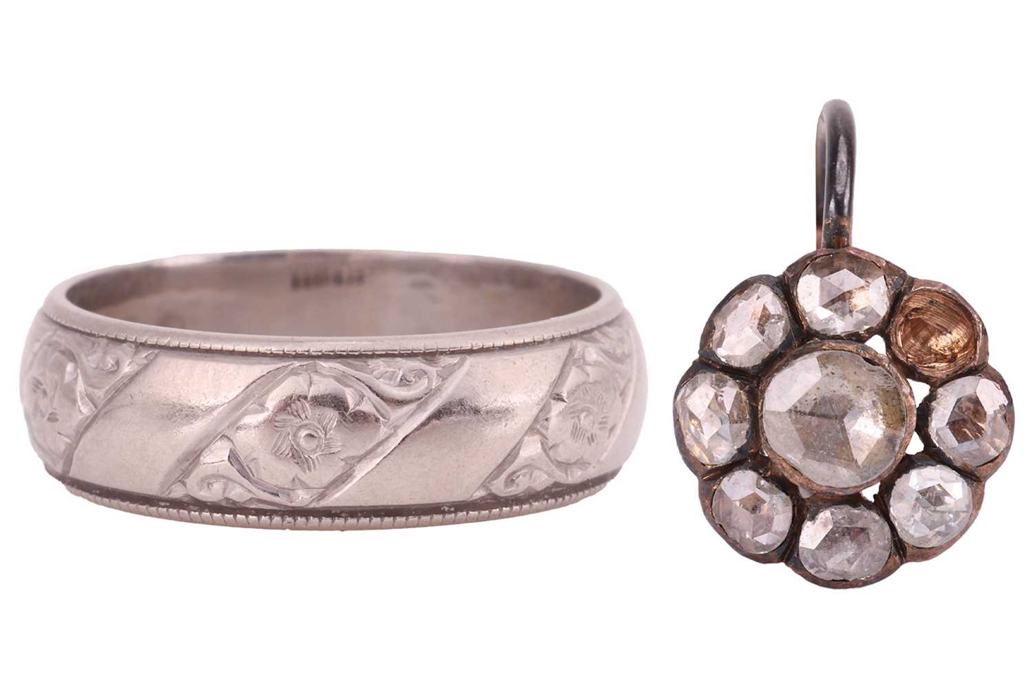 Lot 35 - An 18ct white gold wedding band, the 5.7mm...