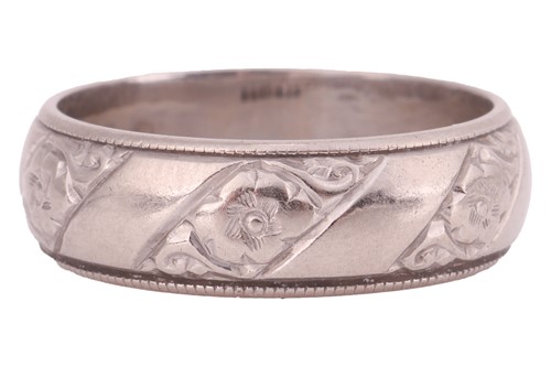 Lot 35 - An 18ct white gold wedding band, the 5.7mm...