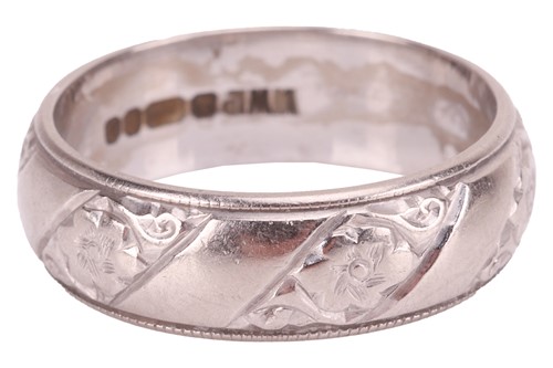 Lot 35 - An 18ct white gold wedding band, the 5.7mm...