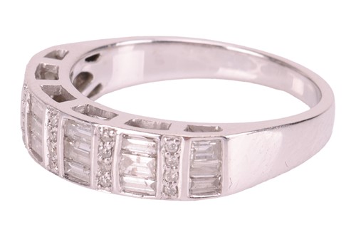 Lot 86 - A diamond half-eternity ring, with an...