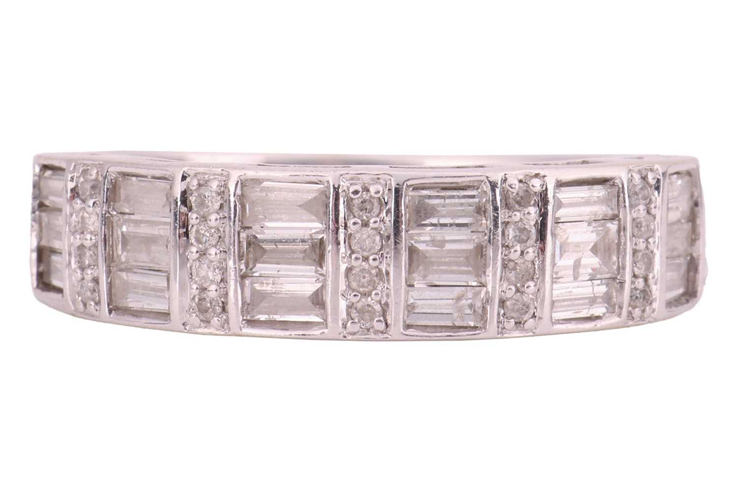 Lot 86 - A diamond half-eternity ring, with an...
