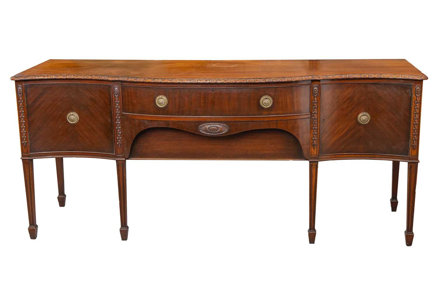 Lot 95 - A mahogany large serpentine sideboard of...