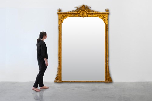 Lot 97 - A late 19th century large carved wood and gilt...