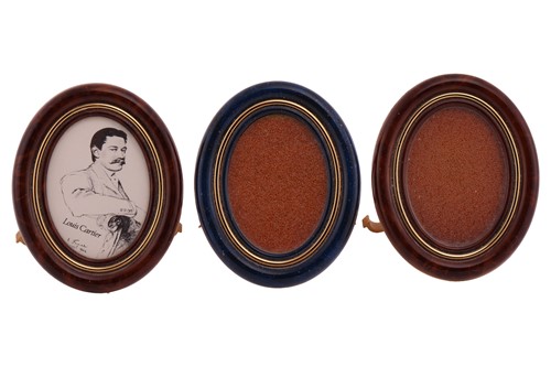 Lot 82 - Three Must de Cartier gilt metal photo frames,...