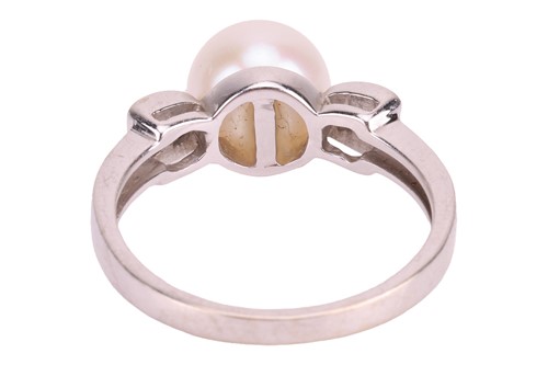 Lot 17 - A cultured pearl and diamond dress ring in...