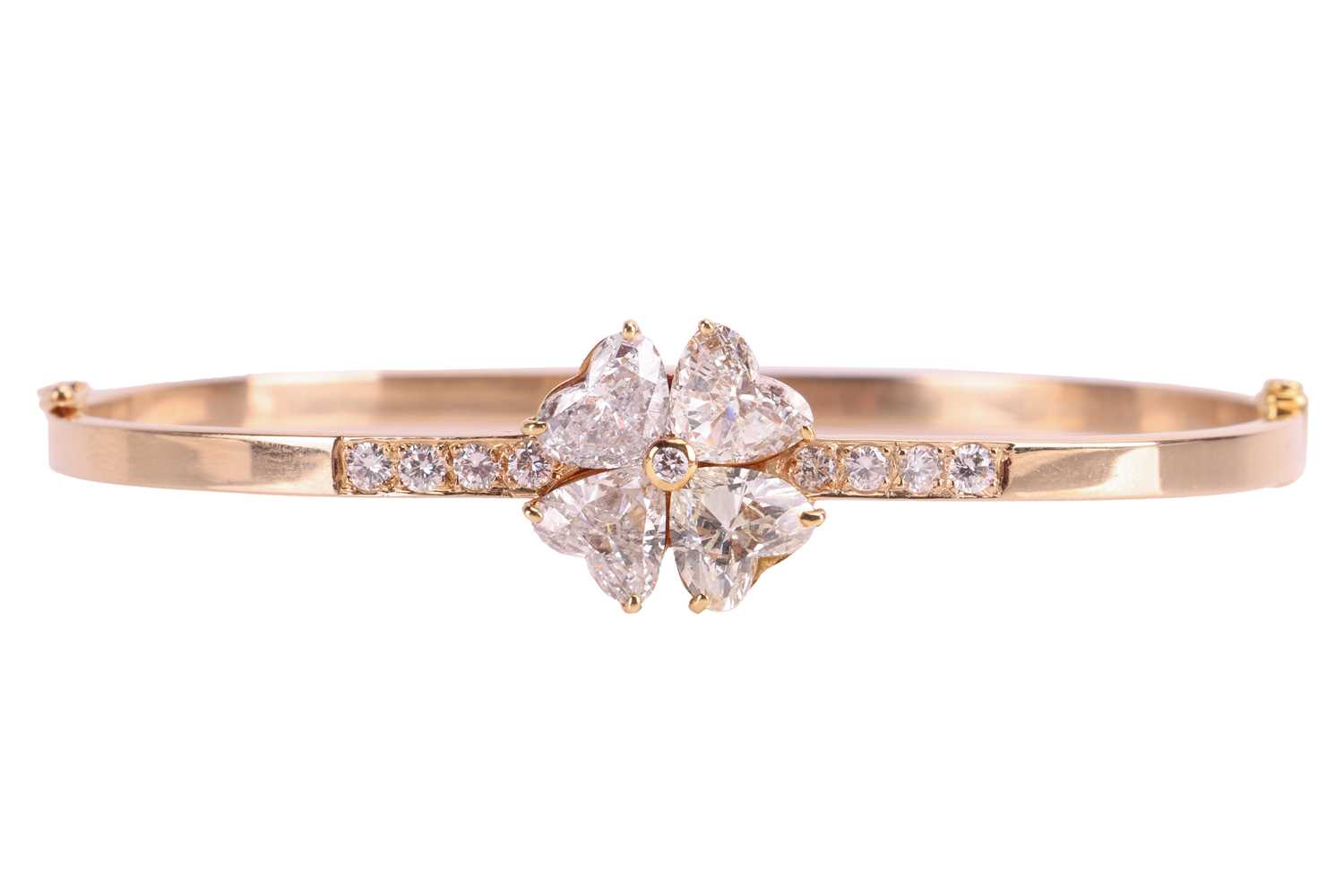 Lot 167 - Boodle & Dunthorne - a diamond-set clover...
