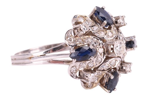 Lot 43 - A diamond and sapphire cluster ring,...