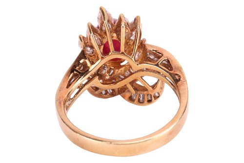 Lot 61 - A gem-set dress ring, claw-set with an oval...