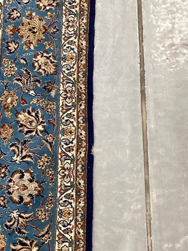 Lot 147 - A blue ground Isfahan prayer rug with a single...