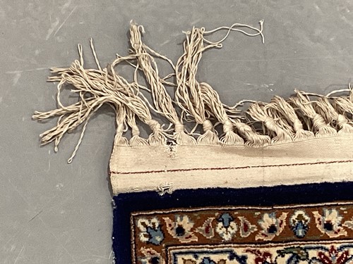 Lot 147 - A blue ground Isfahan prayer rug with a single...