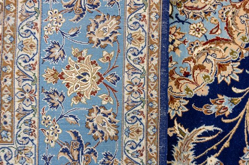 Lot 147 - A blue ground Isfahan prayer rug with a single...