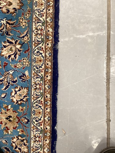 Lot 147 - A blue ground Isfahan prayer rug with a single...