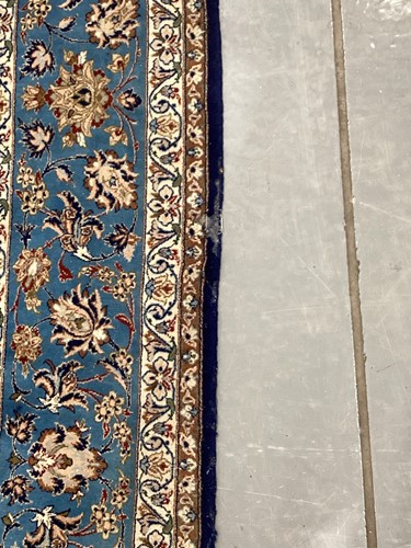 Lot 147 - A blue ground Isfahan prayer rug with a single...
