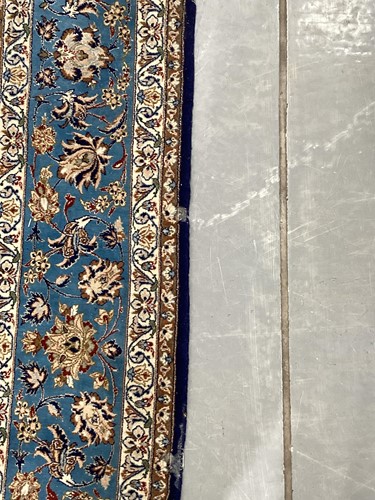 Lot 147 - A blue ground Isfahan prayer rug with a single...