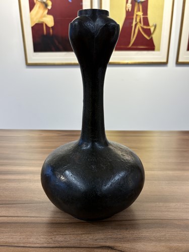 Lot 50 - A Chinese Han Dynasty archaic bronze,...