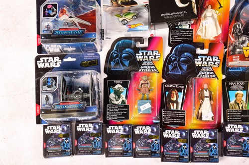 Lot 72 - A collection of Star Wars toys and...