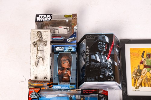 Lot 74 - A collection of Star Wars collectibles, to...