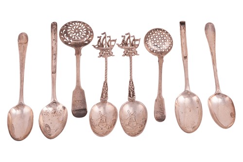Lot 124 - A pair of Dutch style spoons, the terminals...