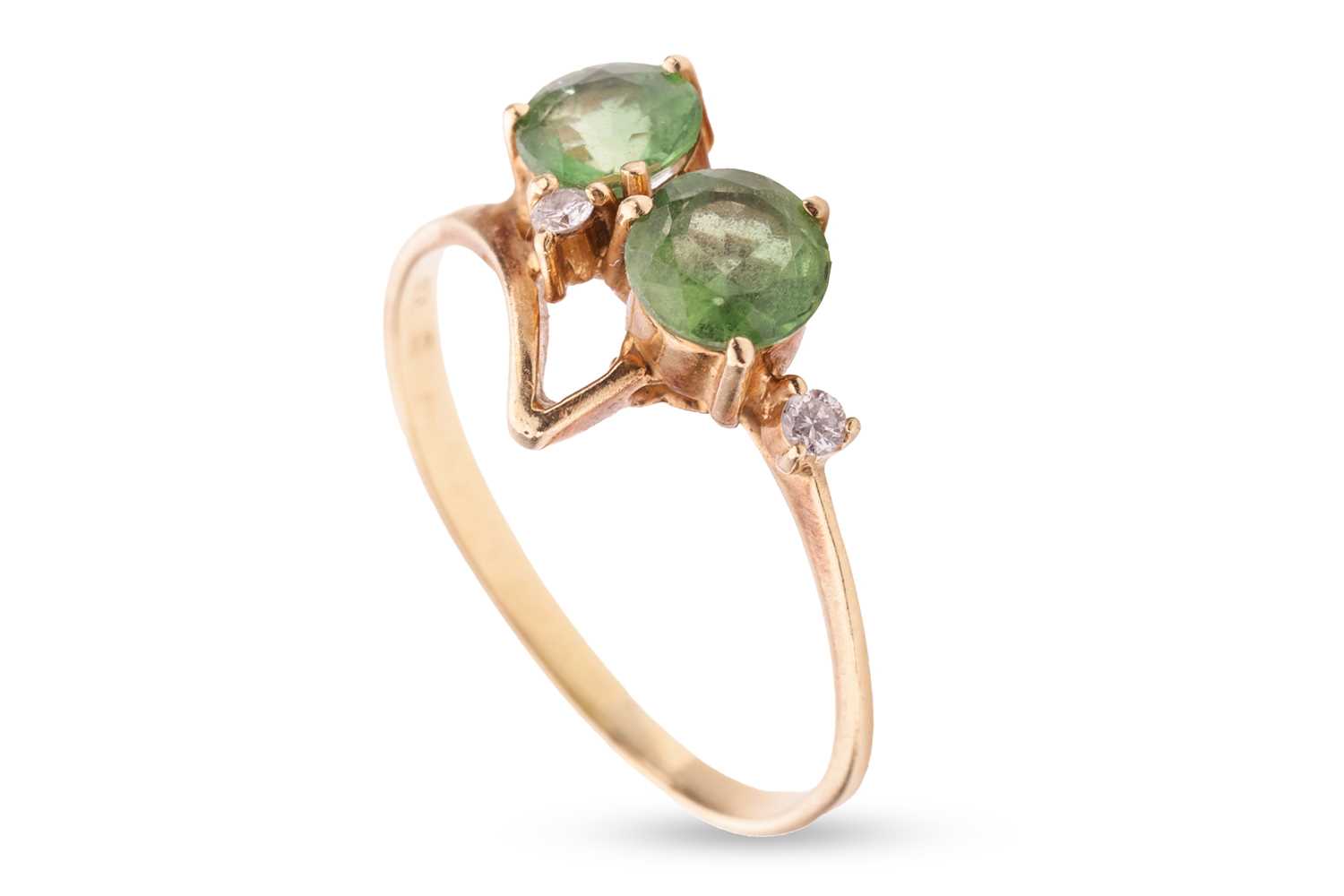 Lot 137 - A tourmaline and diamond dress ring by H.Stern,...
