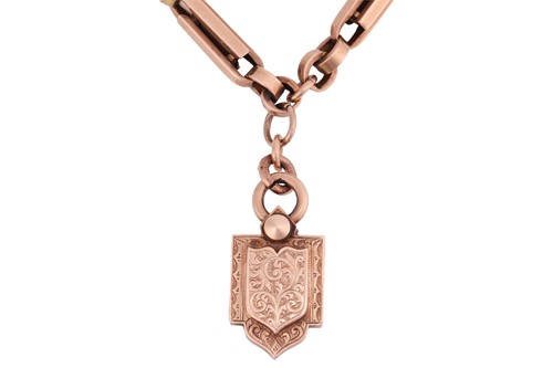 Lot 11 - A Late Victorian locket on chain, comprising a...