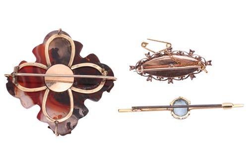 Lot 103 - Three brooches; to include an aquamarine bar...