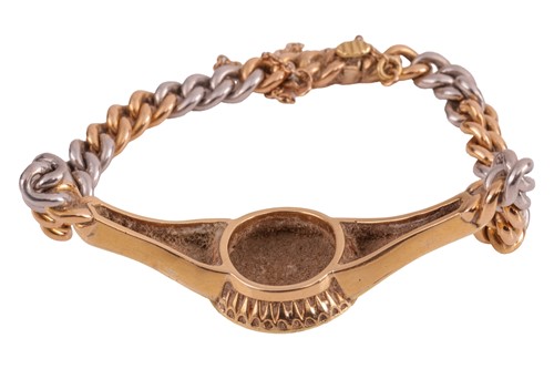 Lot 51 - A monogrammed bracelet, the central circular...