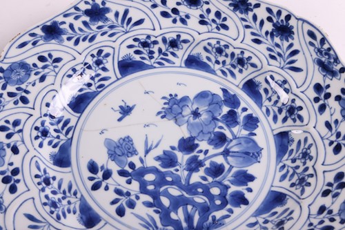 Lot 72 - A set of four Chinese Kangxi blue and white...