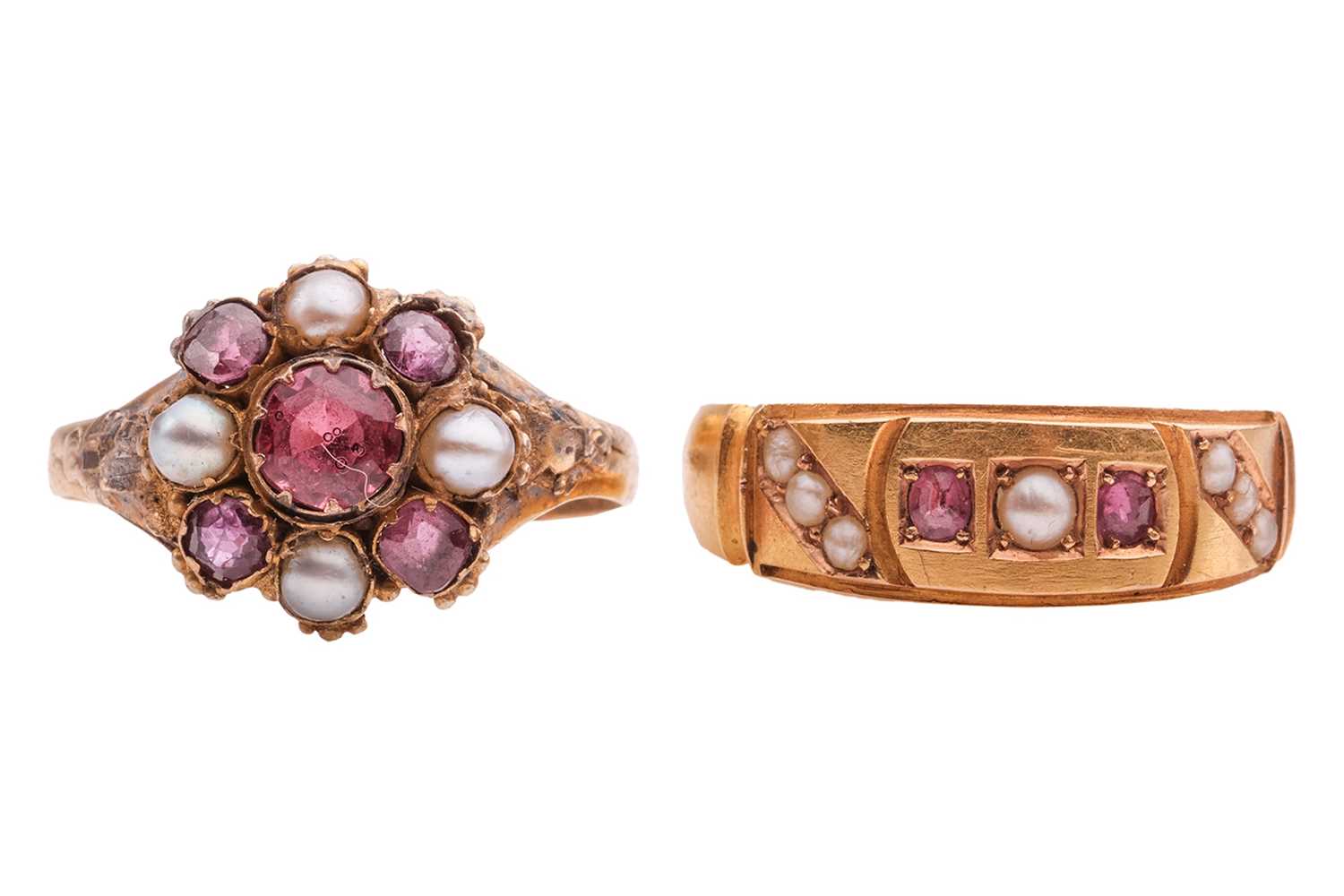 Lot 9 - Two ruby, pearl and paste rings; each set with...